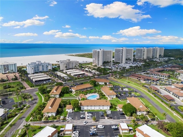 bird's eye view featuring a water view and a city view