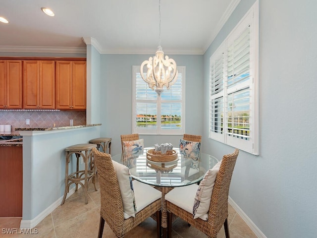 dining room featuring crown molding, recessed lighting, light tile patterned flooring, a chandelier, and baseboards