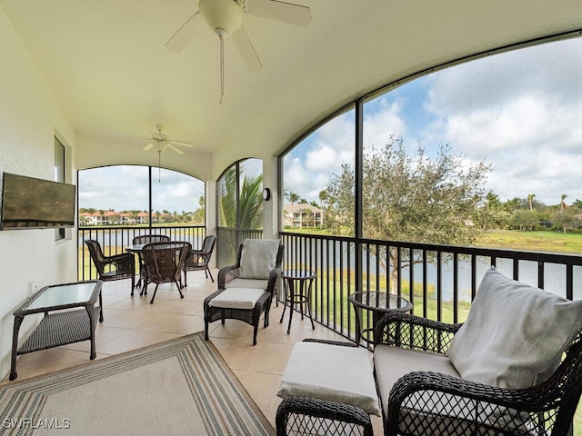 sunroom with a ceiling fan