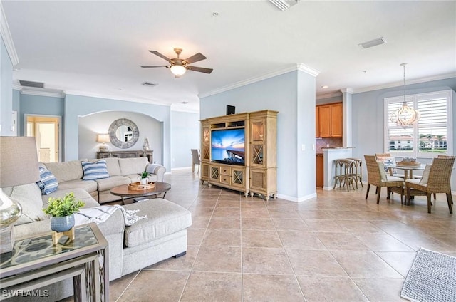 living room with visible vents, a ceiling fan, and light tile patterned flooring