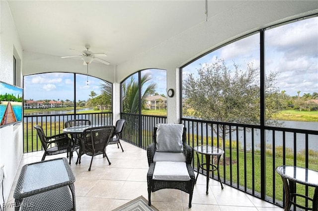 3159 Serena Ln Unit 201, Naples, FL 34114 - sunroom / solarium featuring a ceiling fan and a water view