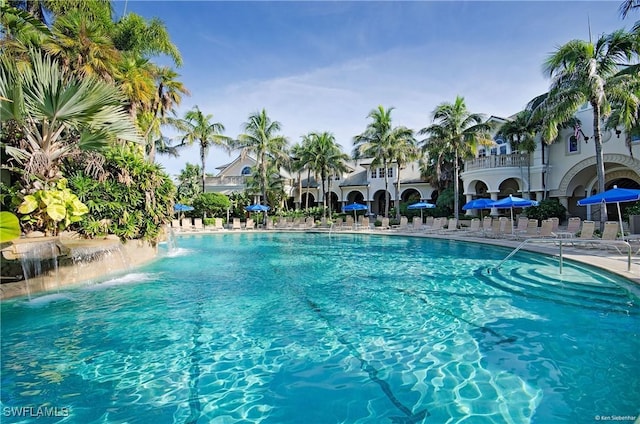 community pool featuring a patio area