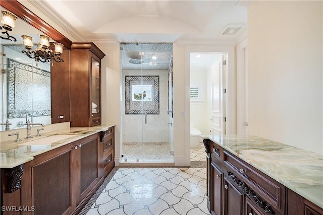 233 Mermaids Bight, Naples, FL 34103 - bathroom with a shower stall, visible vents, an inviting chandelier, toilet, and vanity
