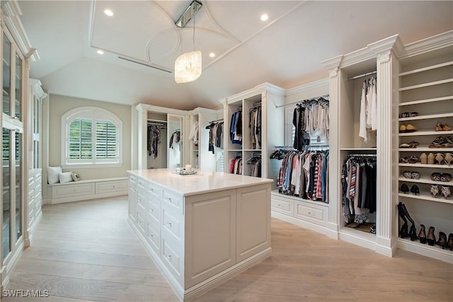 233 Mermaids Bight, Naples, FL 34103 - spacious closet with lofted ceiling and light wood-type flooring
