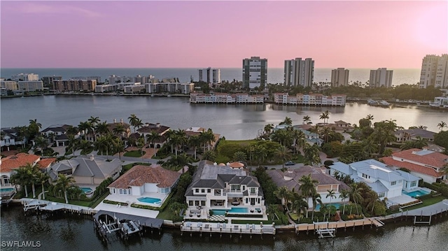 233 Mermaids Bight, Naples, FL 34103 - aerial view with a city view and a water view