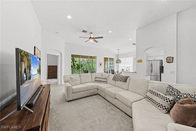 23039 Lone Oak Dr, Estero, FL 33928 - living area with lofted ceiling, recessed lighting, visible vents, a ceiling fan, and carpet flooring