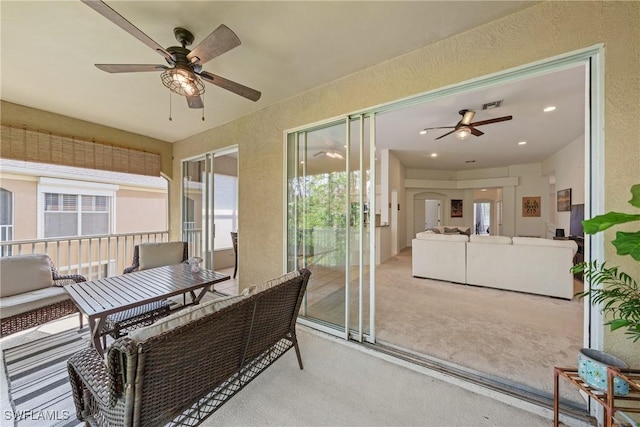23039 Lone Oak Dr, Estero, FL 33928 - interior space with an outdoor hangout area, ceiling fan, and visible vents