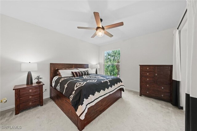 23039 Lone Oak Dr, Estero, FL 33928 - bedroom with baseboards, ceiling fan, and light colored carpet
