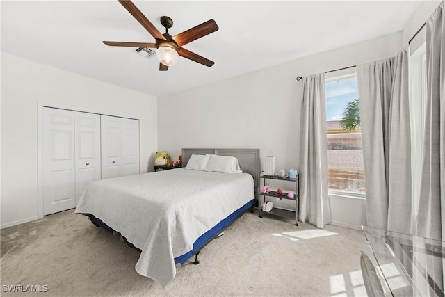 23039 Lone Oak Dr, Estero, FL 33928 - bedroom featuring a ceiling fan, a closet, visible vents, and light colored carpet