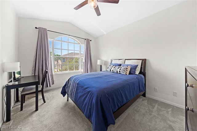 23039 Lone Oak Dr, Estero, FL 33928 - bedroom with light colored carpet, vaulted ceiling, baseboards, and ceiling fan