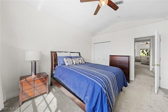 23039 Lone Oak Dr, Estero, FL 33928 - bedroom featuring lofted ceiling, ceiling fan, light colored carpet, visible vents, and a closet