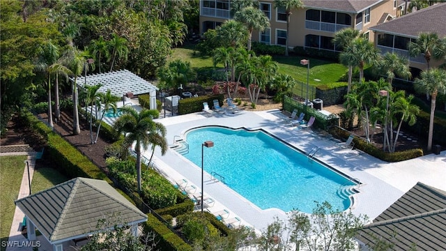 23039 Lone Oak Dr, Estero, FL 33928 - community pool featuring fence, a gazebo, and a patio