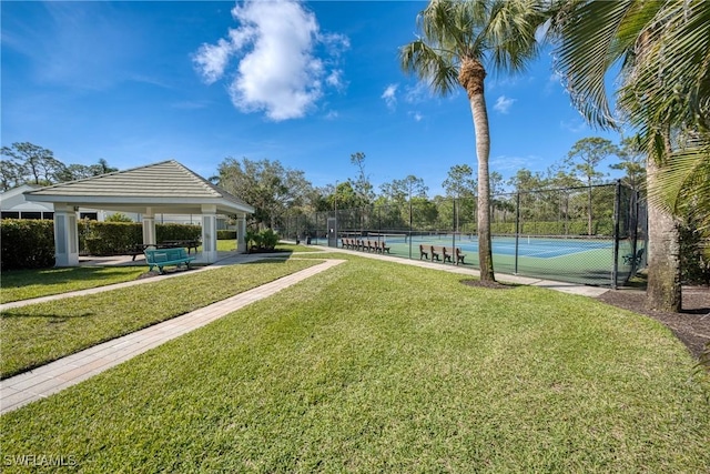 23039 Lone Oak Dr, Estero, FL 33928 - view of community with a tennis court, a lawn, a gazebo, and fence