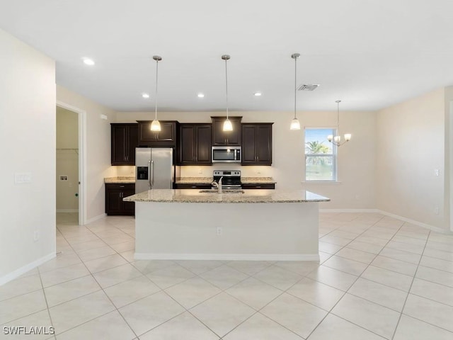 2911 SW 25th Pl, Cape Coral, FL 33914 - kitchen with appliances with stainless steel finishes, a sink, a chandelier, baseboards, and recessed lighting