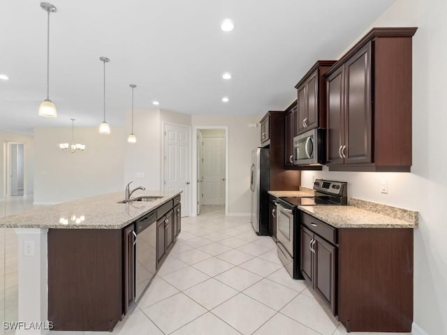 2911 SW 25th Pl, Cape Coral, FL 33914 - kitchen featuring stainless steel appliances, dark brown cabinets, recessed lighting, a chandelier, and a kitchen island with sink
