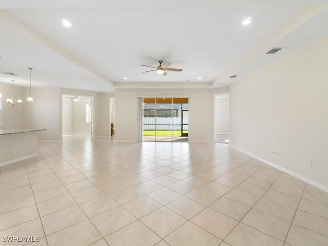 2911 SW 25th Pl, Cape Coral, FL 33914 - spare room with a ceiling fan, light tile patterned floors, recessed lighting, baseboards, and a raised ceiling