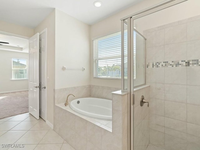 2911 SW 25th Pl, Cape Coral, FL 33914 - full bathroom featuring a shower stall, healthy amount of natural light, a garden tub, tile patterned flooring, and recessed lighting