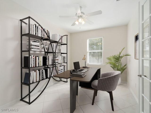 2911 SW 25th Pl, Cape Coral, FL 33914 - office space with ceiling fan, baseboards, and light tile patterned flooring