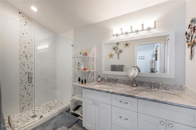 5858 Westbourgh Ct, Naples, FL 34112 - full bathroom with a stall shower, a sink, and double vanity