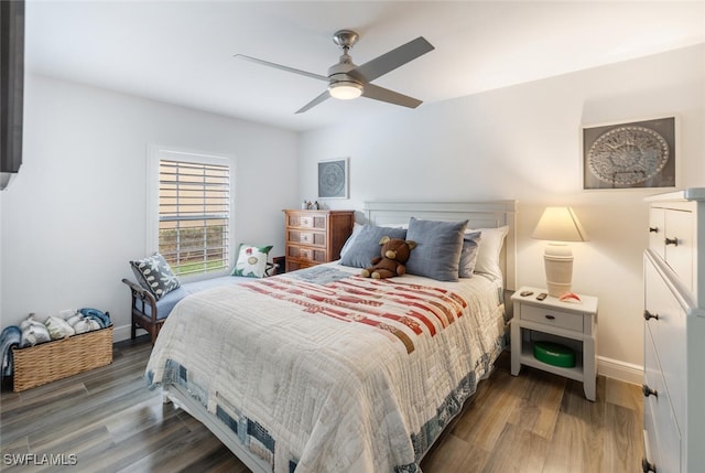 5858 Westbourgh Ct, Naples, FL 34112 - bedroom with ceiling fan, baseboards, and wood finished floors