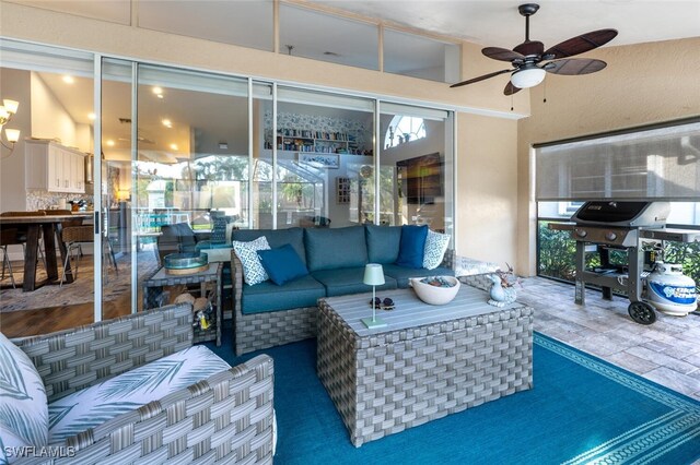 5858 Westbourgh Ct, Naples, FL 34112 - sunroom with a ceiling fan