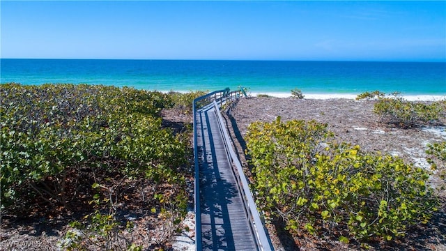 property view of water featuring a beach view