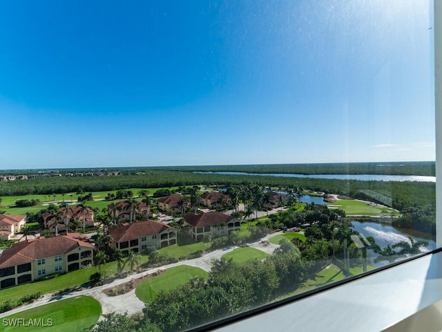 birds eye view of property featuring a water view