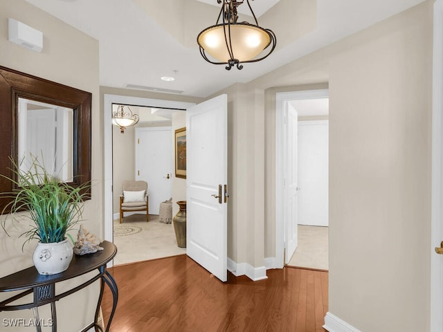 hall featuring hardwood / wood-style flooring