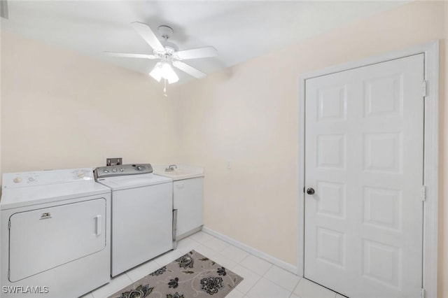 laundry room with visible vents, baseboards, cabinet space, ceiling fan, and washer and clothes dryer