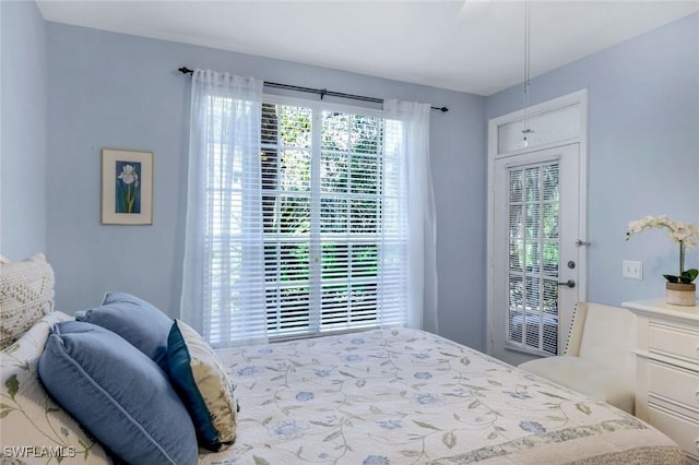 77 Silver Oaks Cir Unit 8-104, Naples, FL 34119 - bedroom with access to exterior