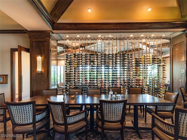 interior space with decorative columns and ornamental molding