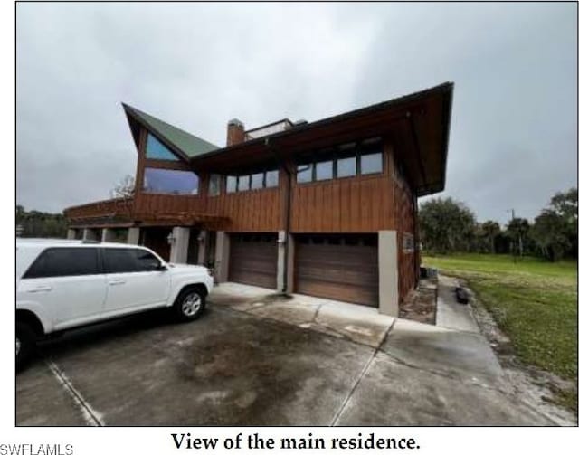 exterior space with a garage