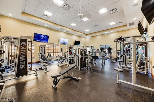 gym featuring visible vents and a drop ceiling