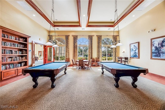 recreation room with billiards, a high ceiling, recessed lighting, and a tray ceiling