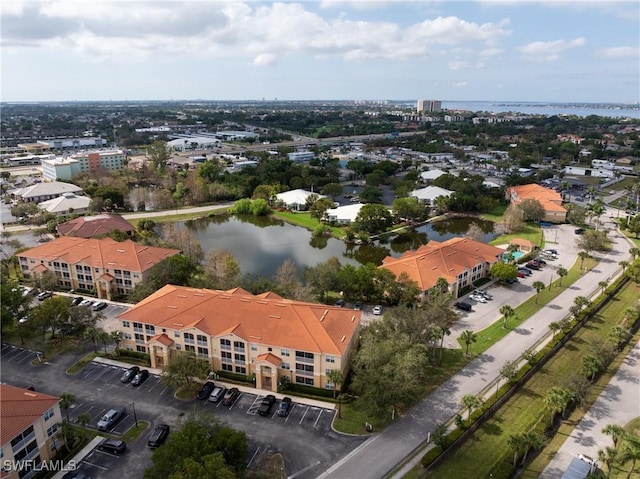 bird's eye view with a water view