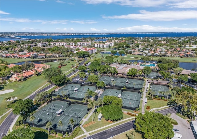 birds eye view of property with a water view