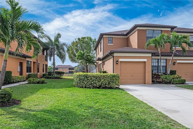 view of property exterior featuring a lawn, driveway, an attached garage, and stucco siding