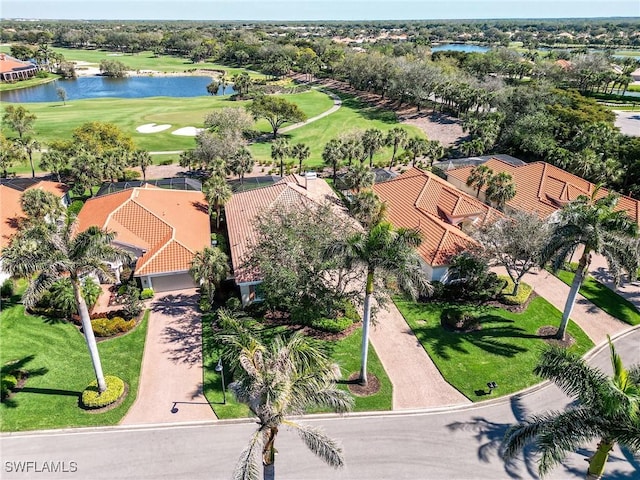 bird's eye view with a water view and golf course view