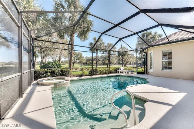 view of swimming pool with a pool with connected hot tub, a patio area, and a lanai