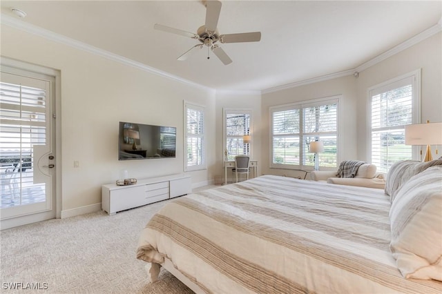 carpeted bedroom with ornamental molding, access to outside, ceiling fan, and baseboards