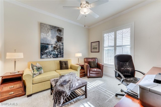 carpeted living room with baseboards, a ceiling fan, and crown molding