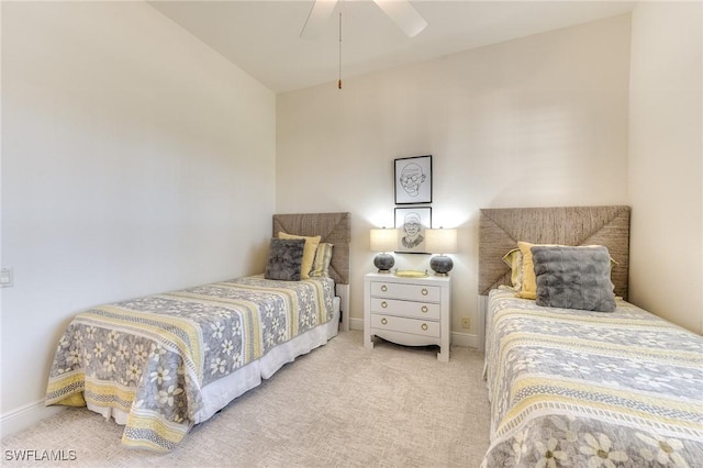 bedroom with carpet floors, ceiling fan, and baseboards