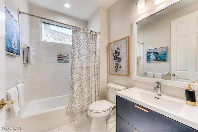 full bathroom featuring toilet, vanity, shower / tub combo with curtain, and tile patterned floors