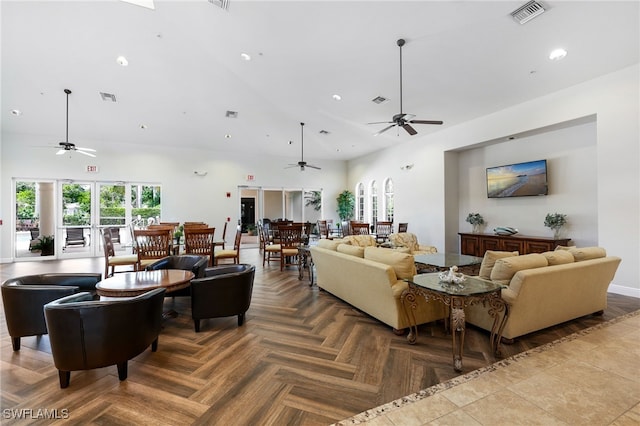 living room featuring visible vents, ceiling fan, and recessed lighting
