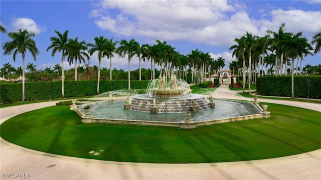 surrounding community with a yard