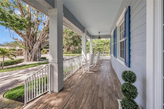 wooden terrace with a porch