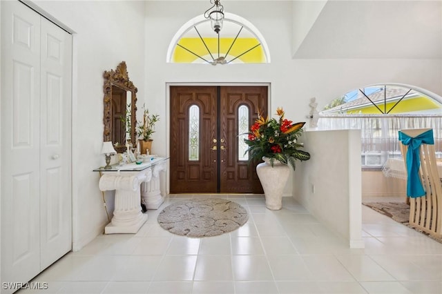 entrance foyer featuring light tile patterned floors