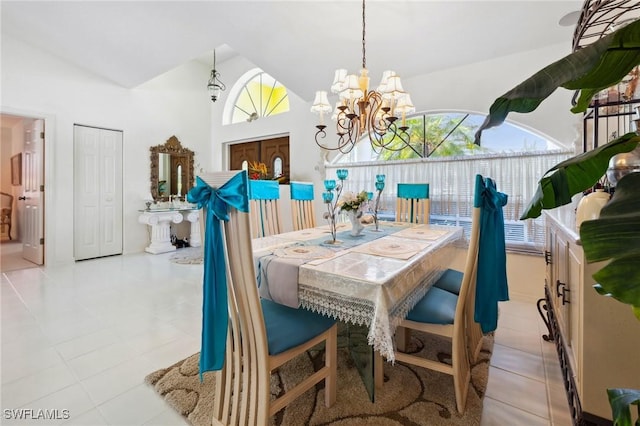 dining room featuring vaulted ceiling, a notable chandelier, and light tile patterned flooring