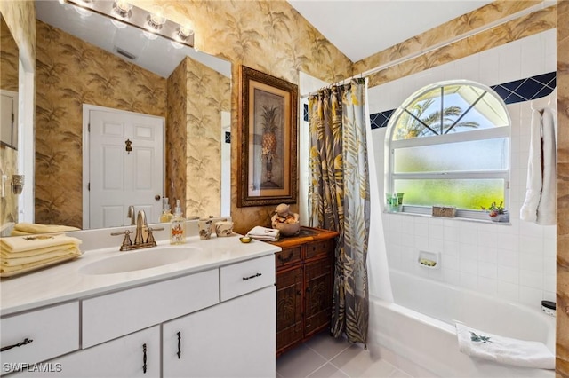 bathroom with shower / bathtub combination with curtain, tile patterned floors, vanity, and wallpapered walls