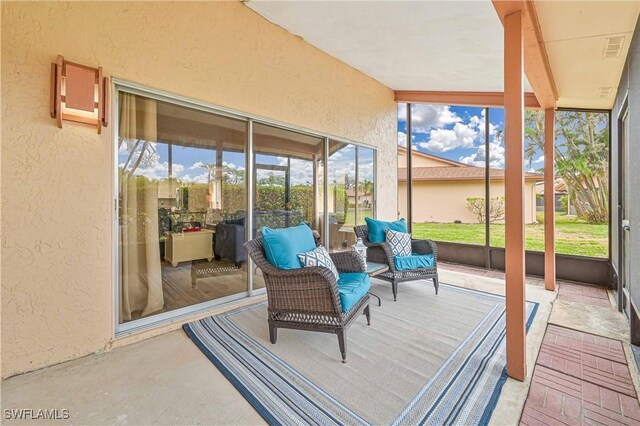 sunroom / solarium featuring visible vents